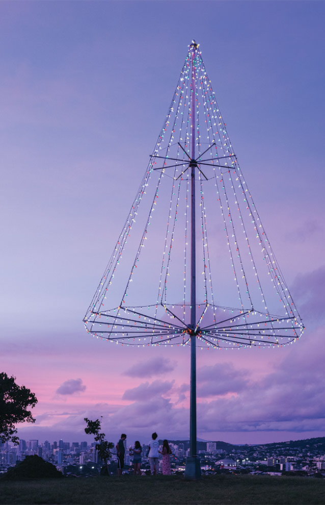 purple sunset with a silhouette of a triangular pole. 